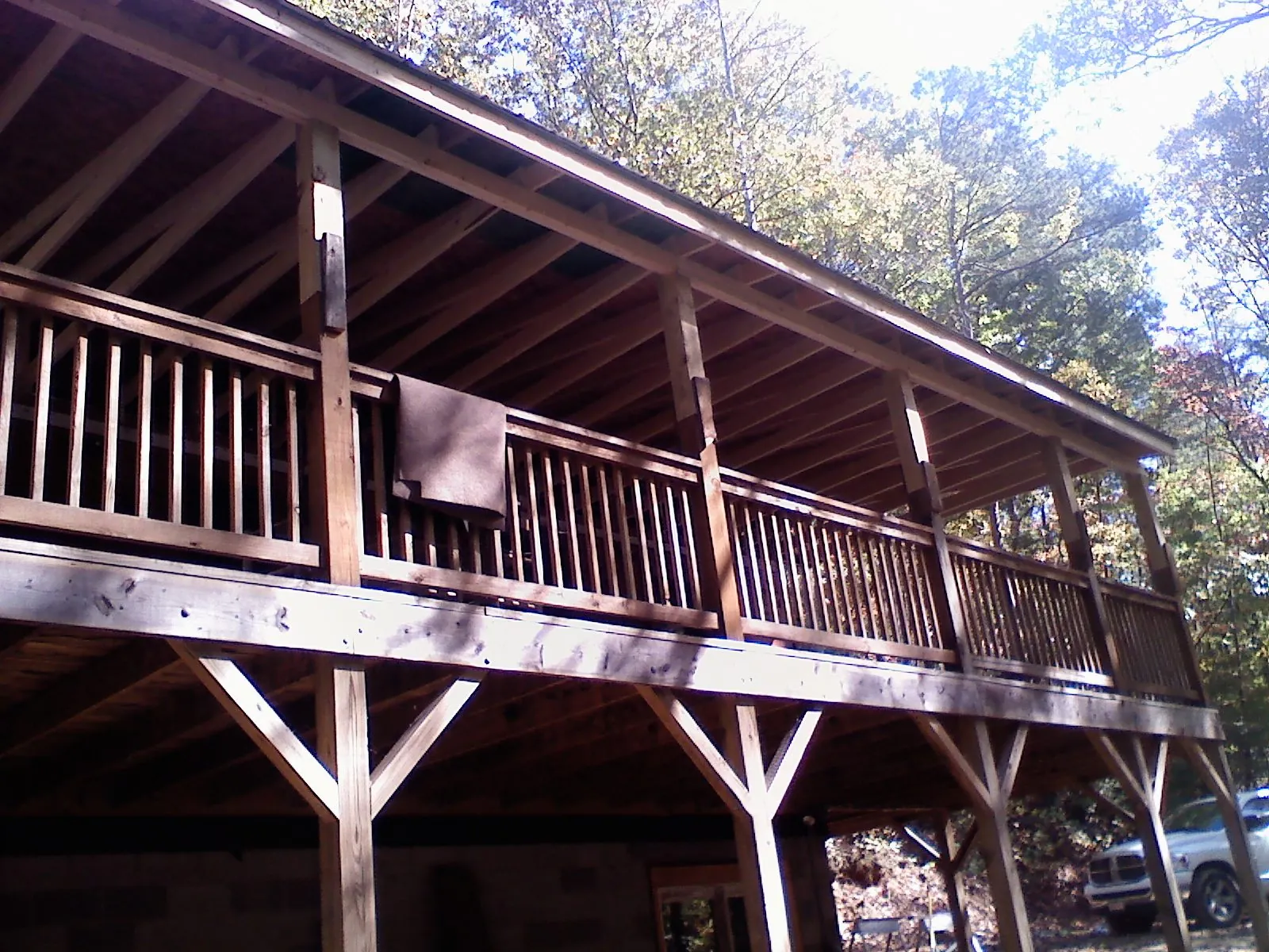 Timber framing under a new elevated porch and deck — Roof Leak Repair in Raymore by Roofing Brothers
